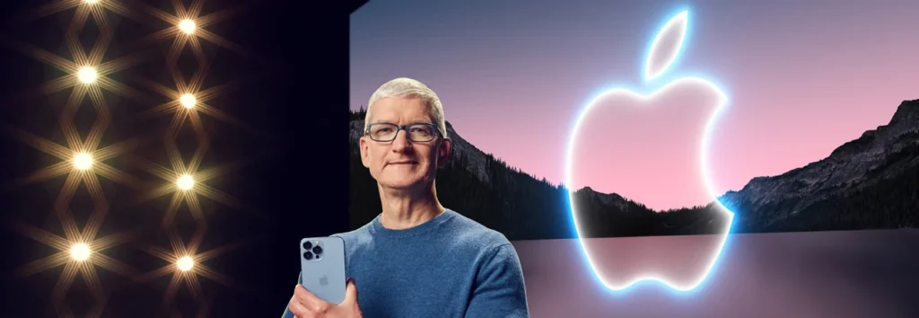 Apple CEO Tim Cook showcasing new iPhone at Apple Event 2024