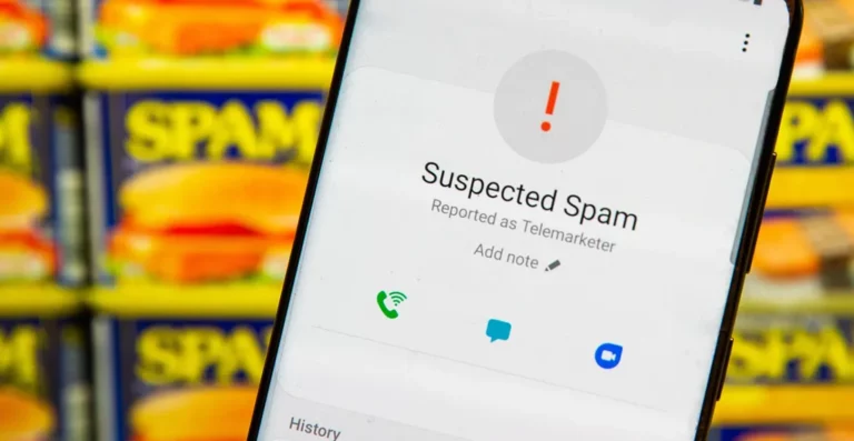 Smartphone blocking suspected spam/nuisance caller with "Spam" background